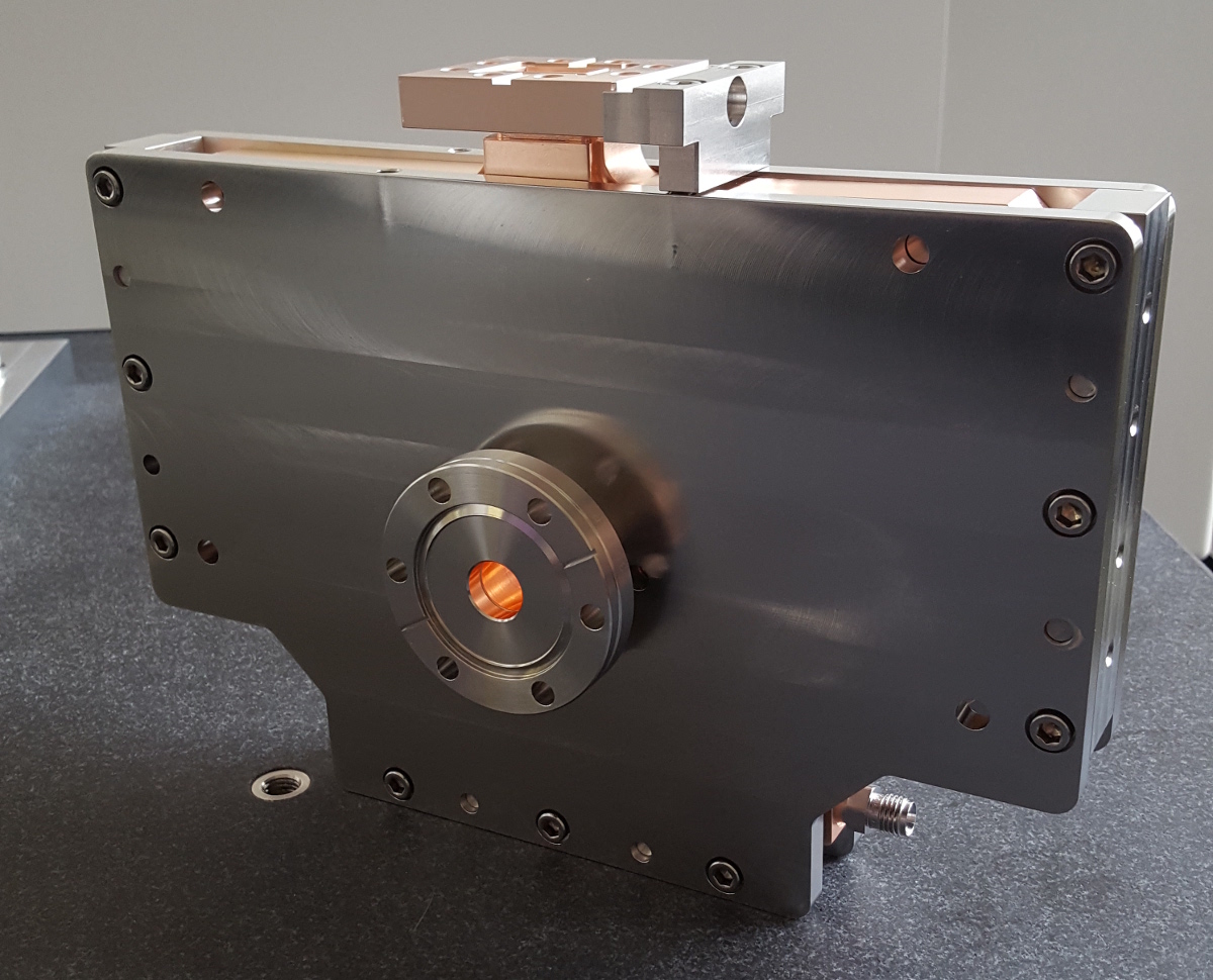 Machined copper mode launcher for an X-band RF gun