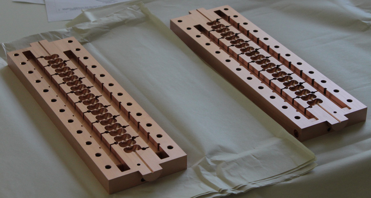 Precision-machined copper split-section accelerator structures